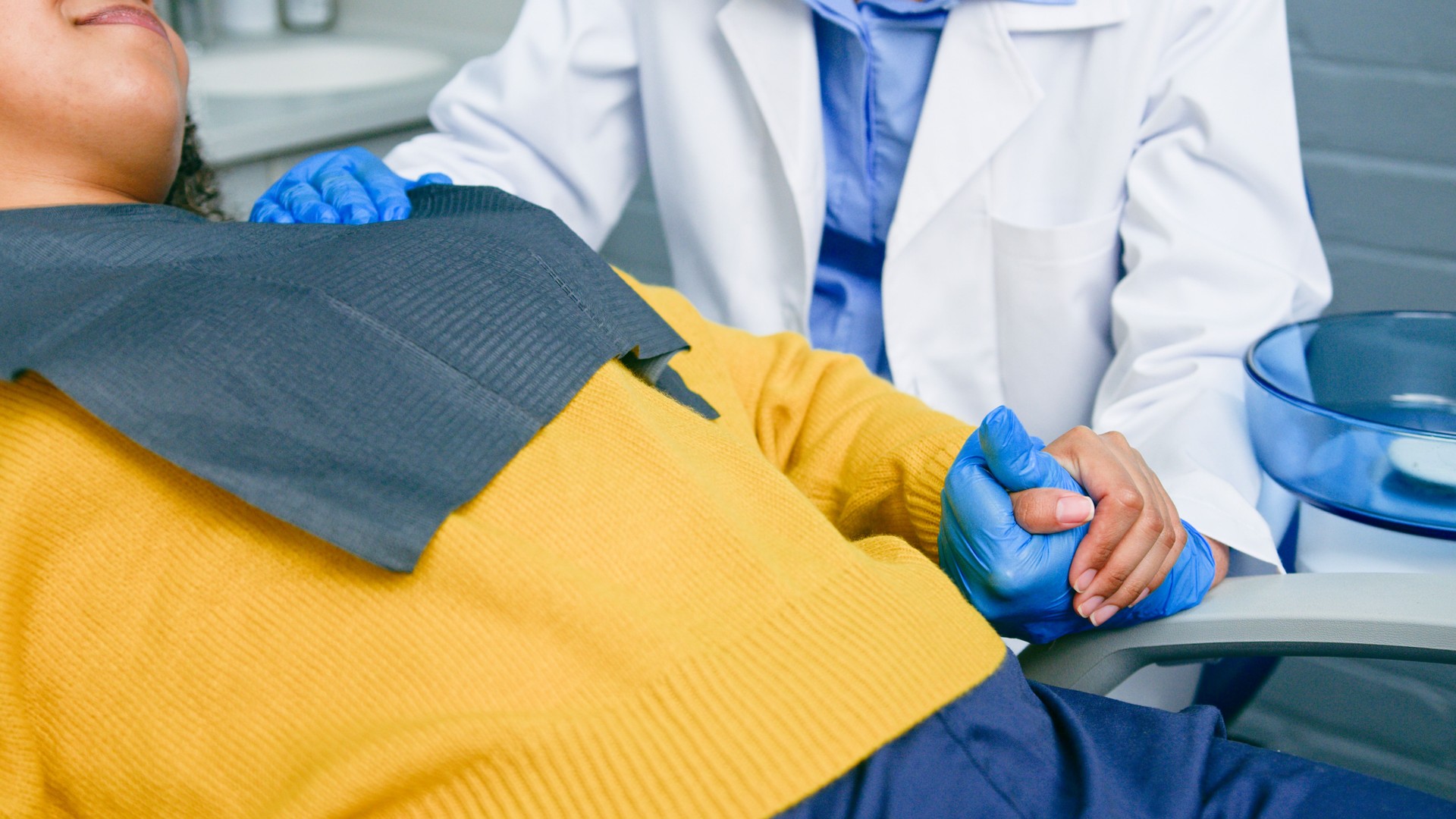 Dental Patient and Professional in Supportive and Reassuring Interaction